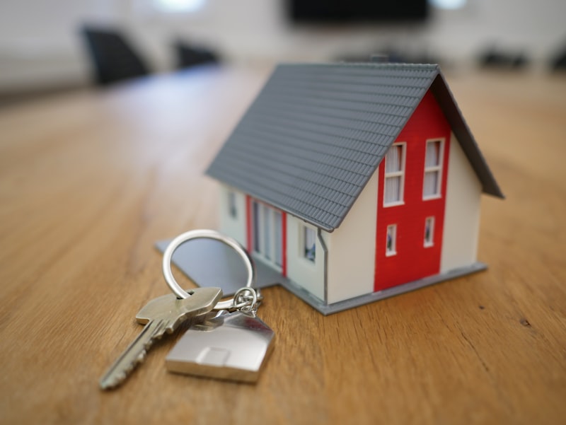 High-end real estate office interior building, navy blue and gold accents, professional atmosphere, photorealistic, 8k